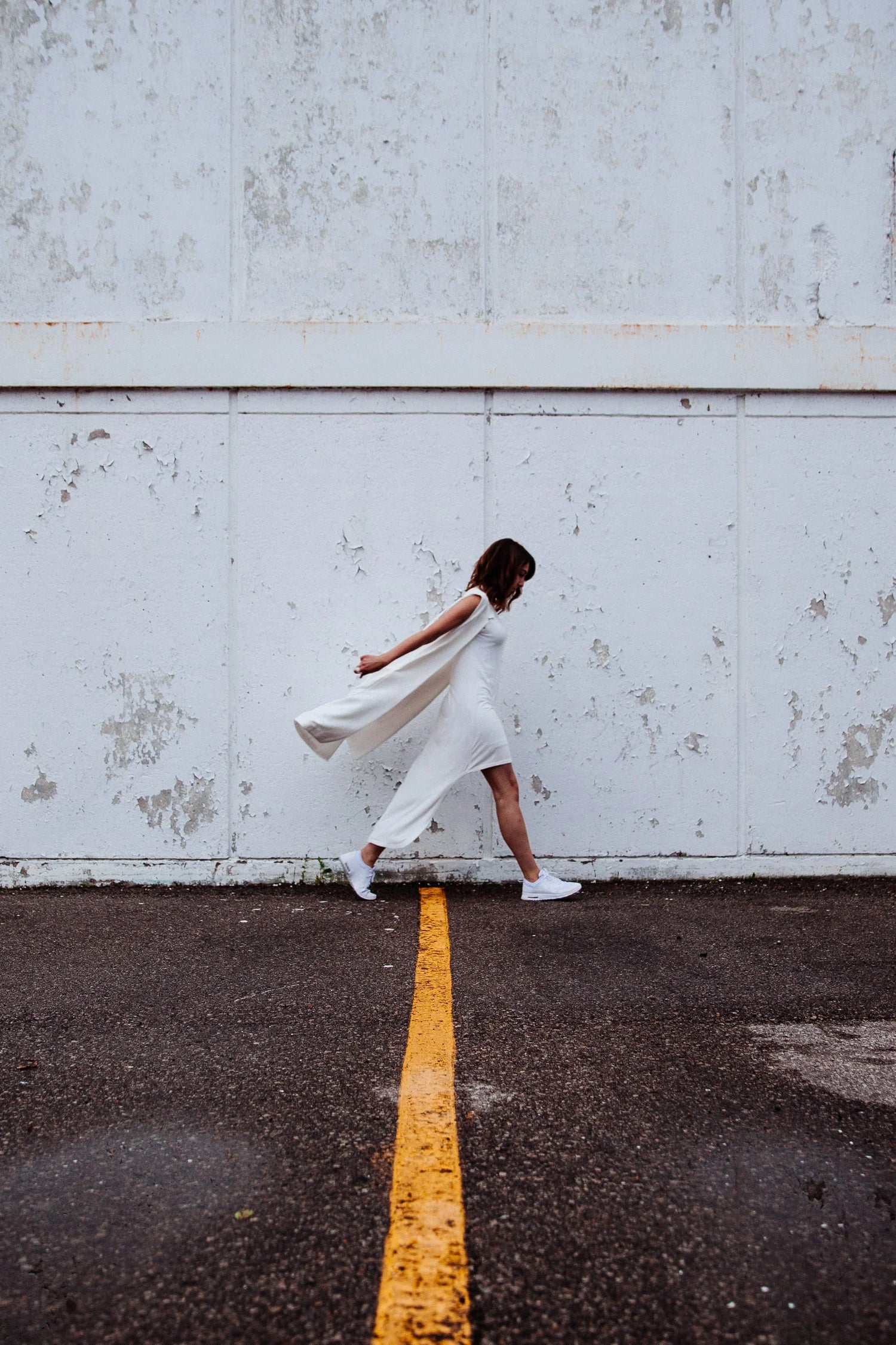 woman in white dress outside