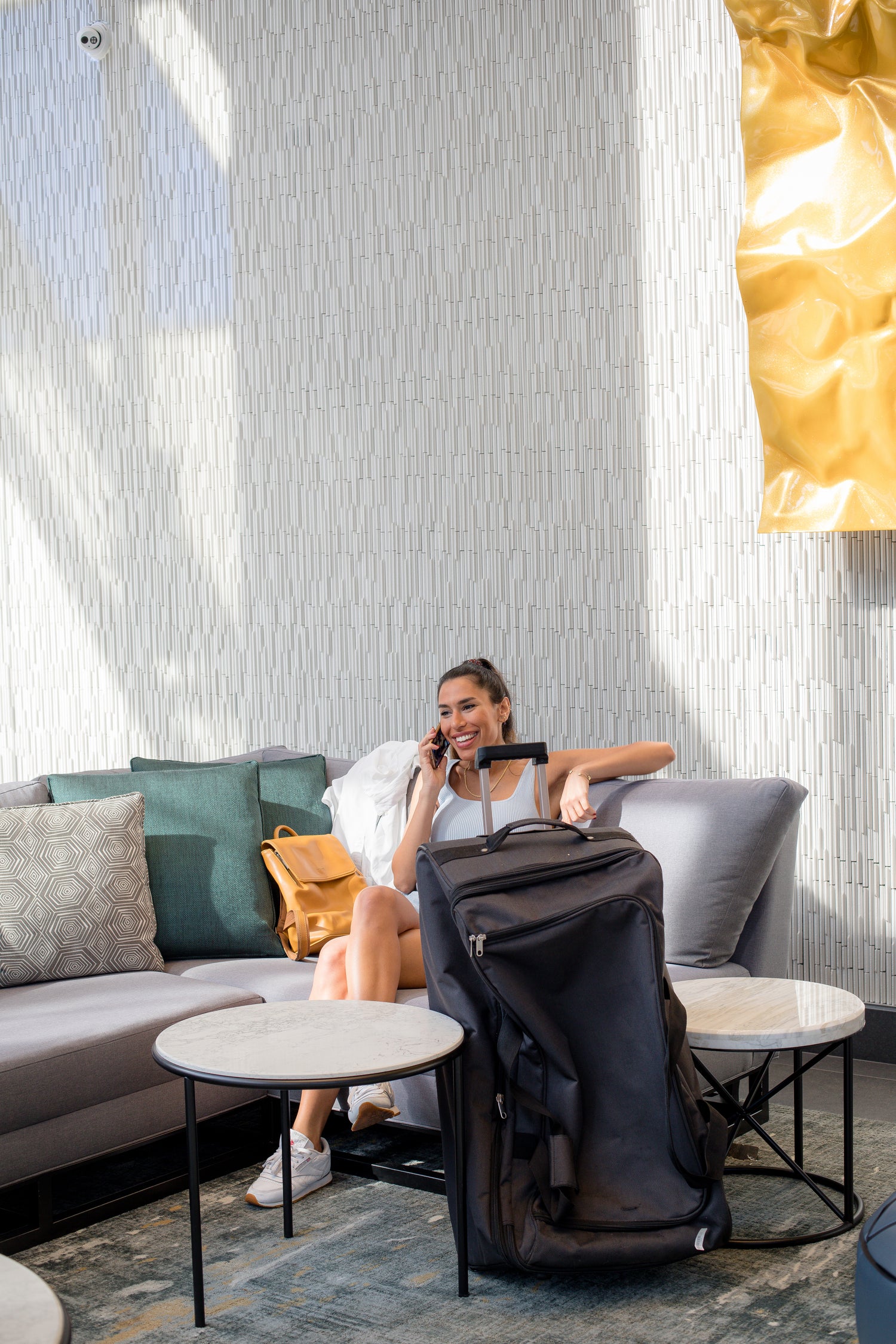 woman alks on her cell phone